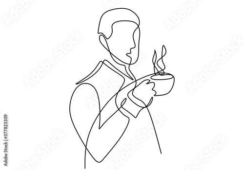 One continuous line drawing of young happy man enjoying and holding a cup of coffee. Young male drinking coffee while sitting on the sofa in home. Relaxing mind with coffee concept