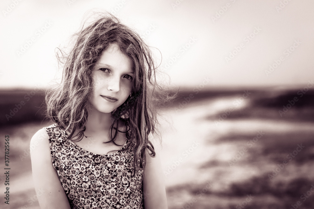 Teenage Girl looking toward the camera (black and white)