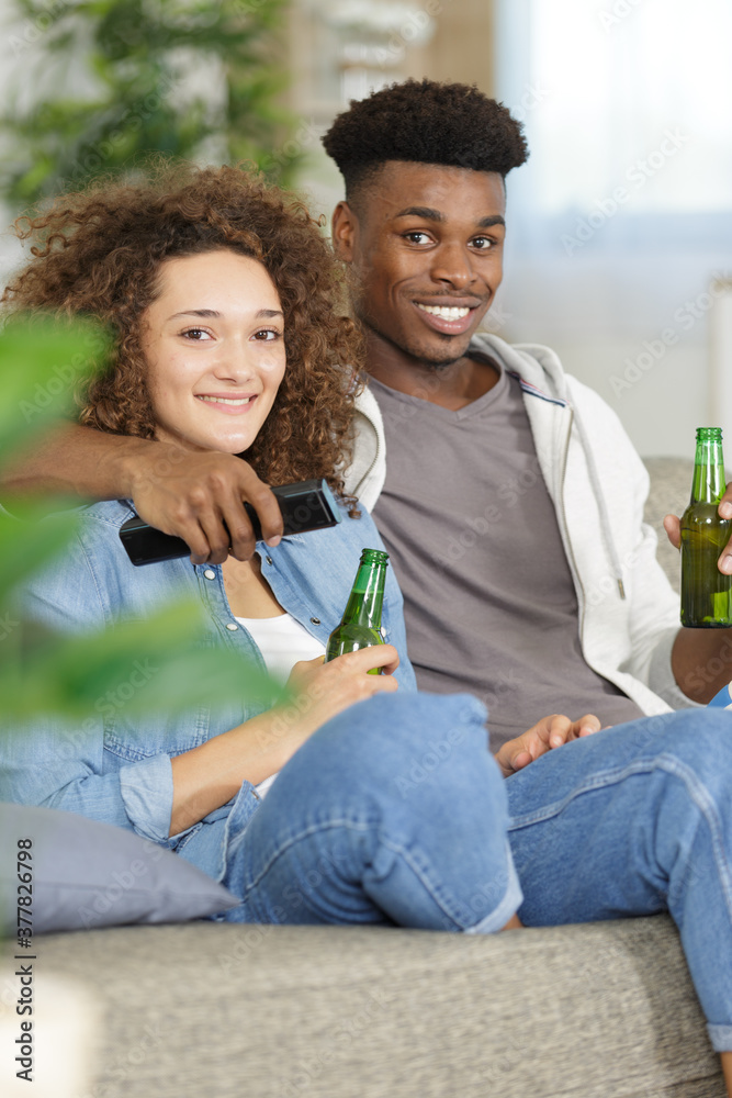 attractive young couple sitting on the floo attractive young couple sitting on the floo