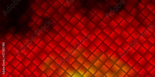 Light Red, Yellow vector background in polygonal style. © Guskova