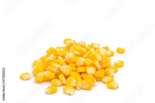 A pile of ripe corn kernels yellow sweet delicious Put on a white background