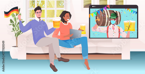 couple drinking beer discussing with man in mask during video call octoberfest party celebration self isolation concept living room interior horizontal vector illustration