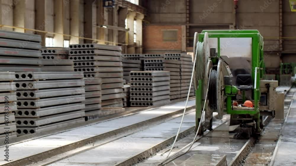 Concrete blocks in factory. Production process of concrete blocks Concrete blocks in factory. Production process of concrete blocks