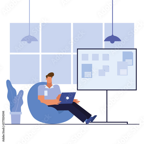 man with laptop in the office vector design