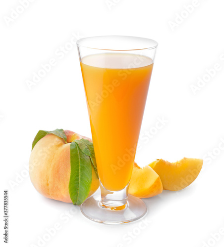 Glass of fresh peach juice on white background