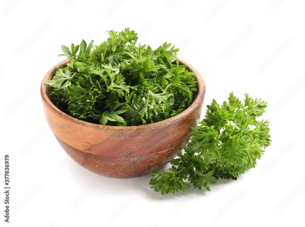Fresh parsley in bowl on white background