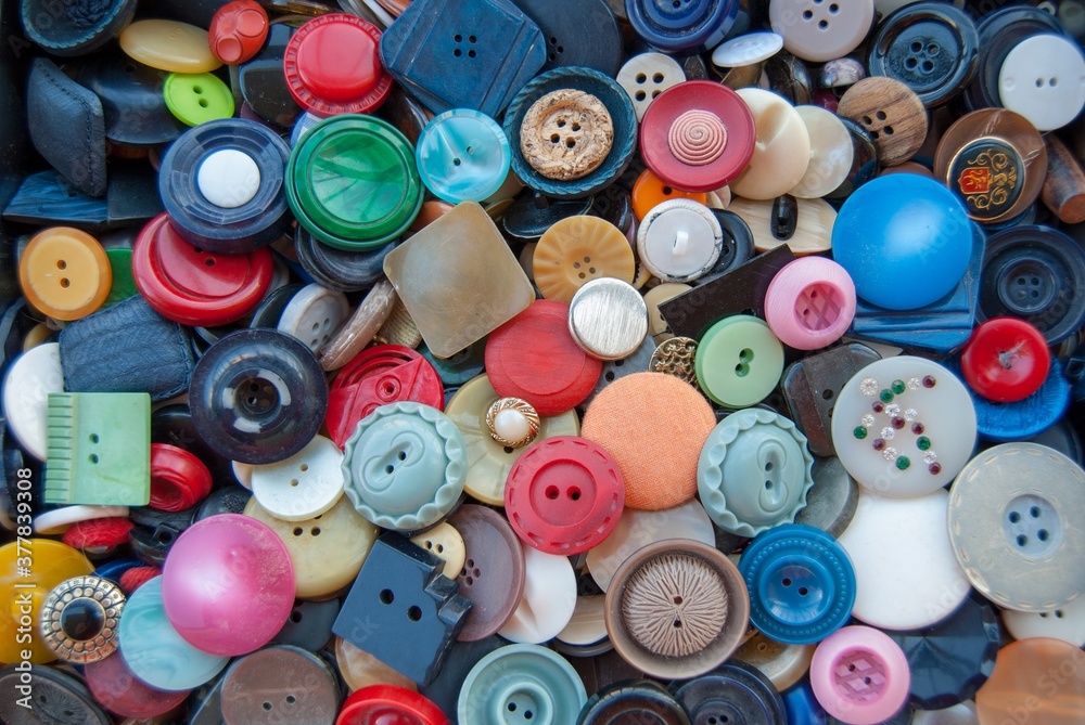 buttons on the wooden background buttons on the wooden background