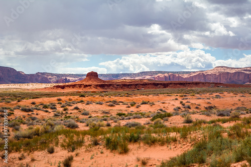 Red sandy desert at Monument Valley, Arizona, USA