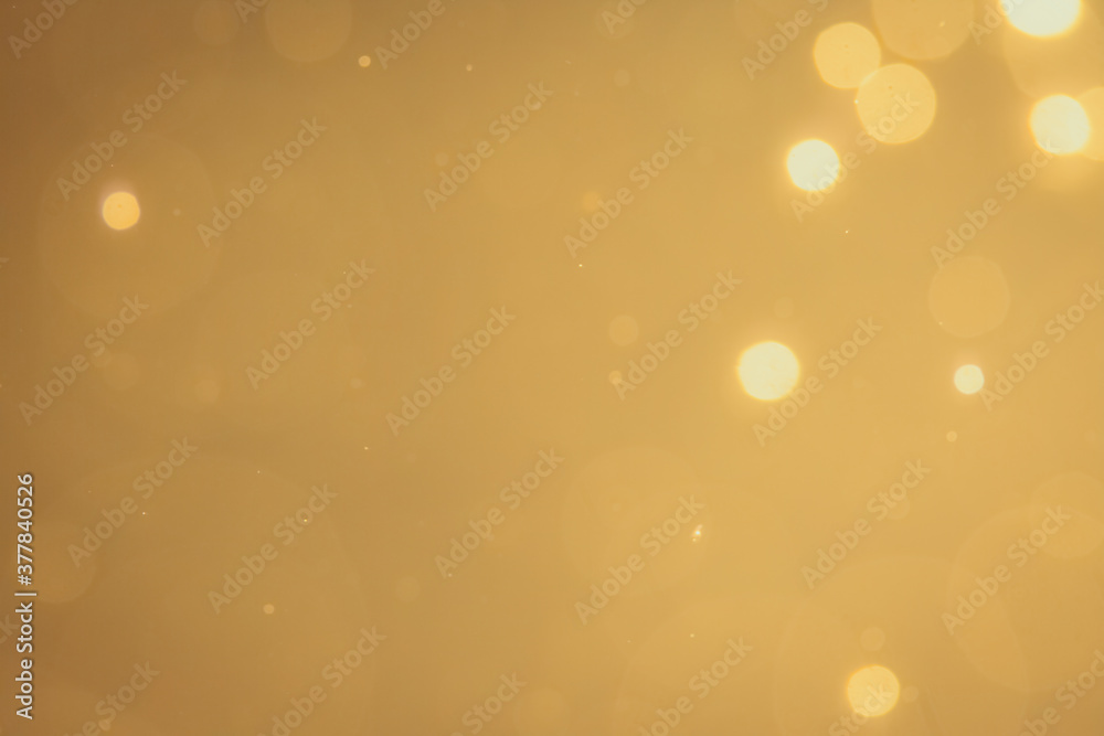 Dark Abstract Gold bokeh sparkle on black background Dark Abstract Gold bokeh sparkle on black background