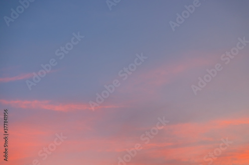 sky and cloud in bright rainbow at sunset