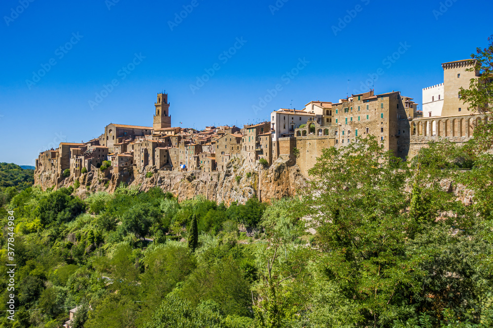 Pitigliano, Tuscany perched on tuff cliff, Old Town and alleys. Splendid town in the Tufo Area, in the heart of Tuscan Maremma, Pitigliano perched on tuff cliff one of most beautiful villages in Italy