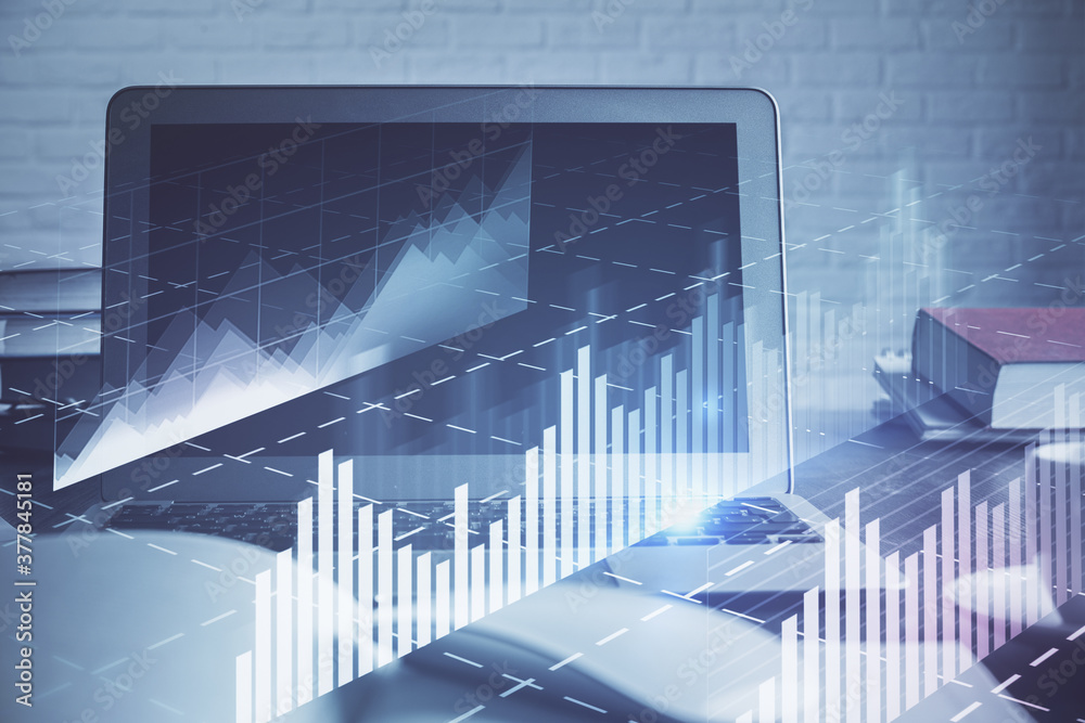 Stock market graph on background with desk and personal computer. Double exposure. Concept of financial analysis. Stock market graph on background with desk and personal computer. Double exposure. Concept of financial analysis.