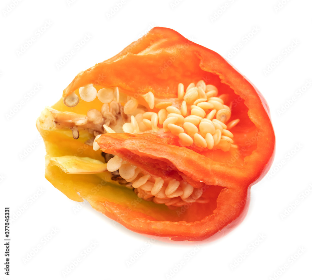 Red bell pepper with seeds isolated on a white background. Red bell pepper with seeds isolated on a white background.