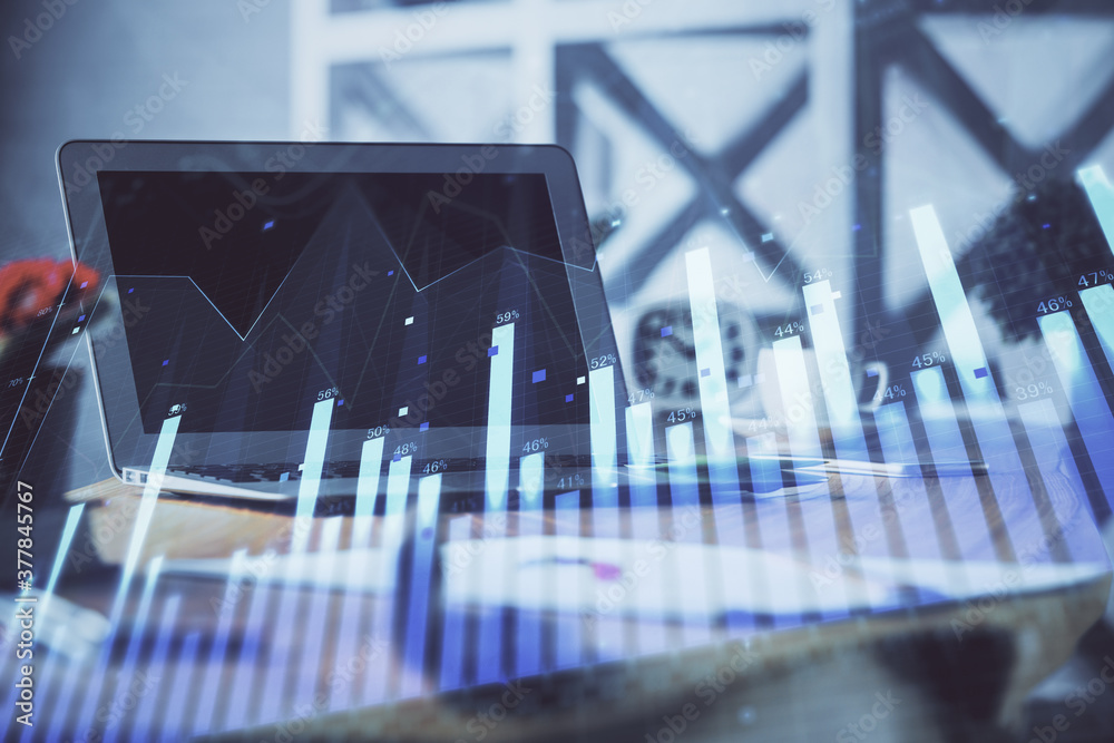 Stock market graph on background with desk and personal computer. Multi exposure. Concept of financial analysis. Stock market graph on background with desk and personal computer. Multi exposure. Concept of financial analysis.