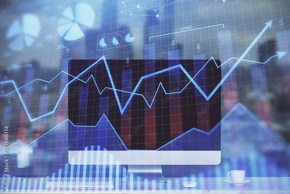 Financial market graph hologram and personal computer on background. Double exposure. Concept of forex. Financial market graph hologram and personal computer on background. Double exposure. Concept of forex.