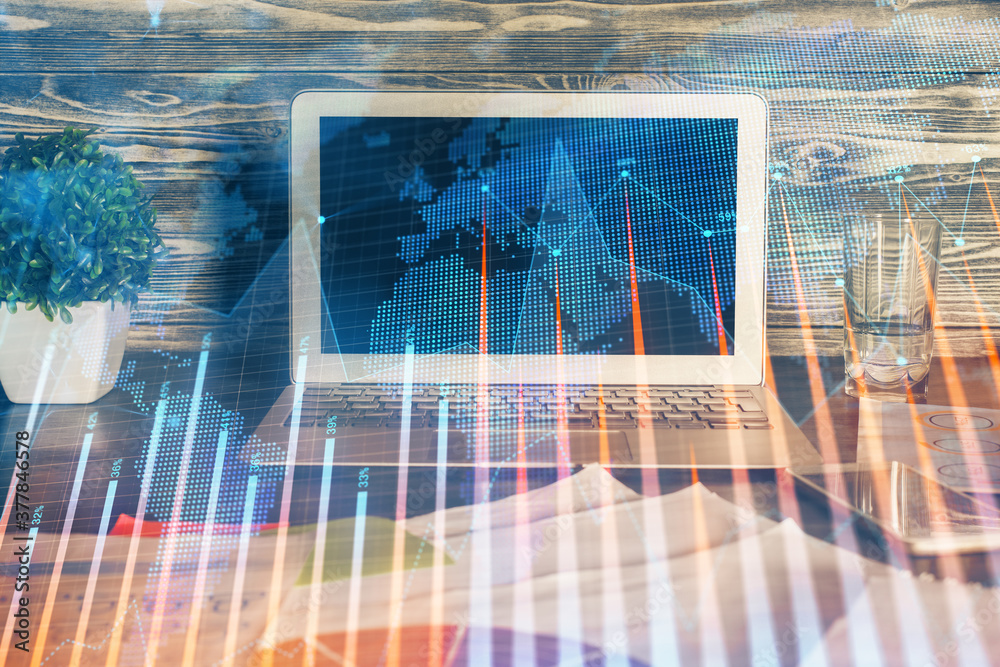 Multi exposure of forex graph and work space with computer. Concept of international online trading. Multi exposure of forex graph and work space with computer. Concept of international online trading.