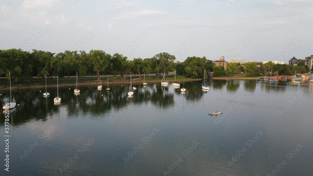 Boats in a lake in minneapolis during summer time Boats in a lake in minneapolis during summer time