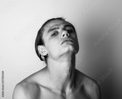 Portrait of handsome topless male model