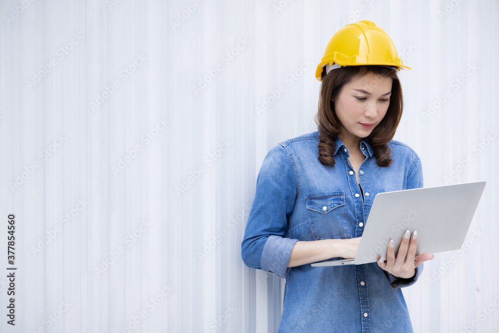 Female engineer working at construction site. Female engineer working at construction site.