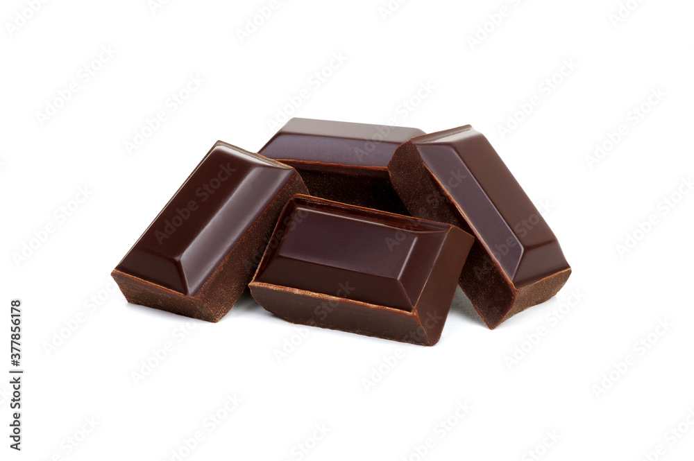 close up of chocolate pieces on white close up of chocolate pieces on white