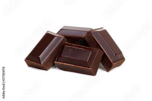 close up of chocolate pieces on white