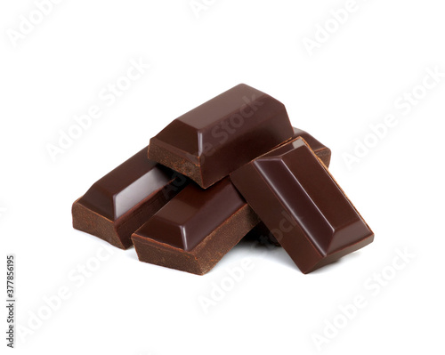 close up of chocolate pieces on white
