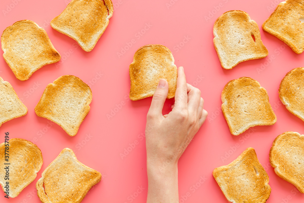 Layout of toast bread slices, food background. Overhead view Layout of toast bread slices, food background. Overhead view