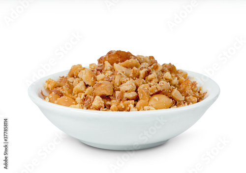 Fried ground peanuts in bowl isolated on white background ,include clipping path