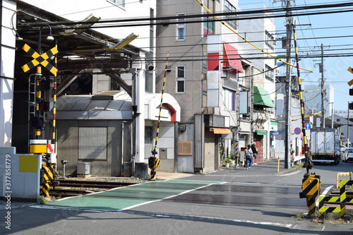 Cityscape with railroad crossing at Yokohama, Japan