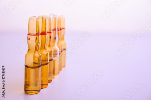 Copy space photo medical ampoules on a white background. Close-up