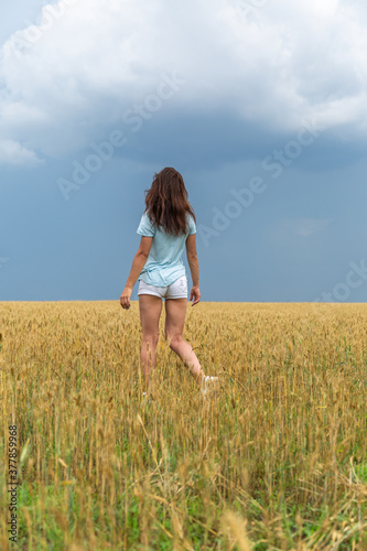 Young Woman In Wheat Field At Summer © spaceneospace