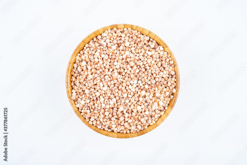 Grain grain sorghum rice in a bowl on white background Grain grain sorghum rice in a bowl on white background