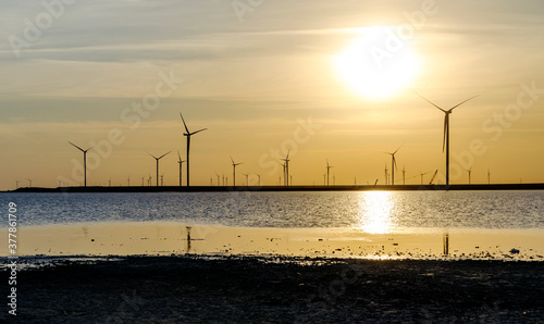 wind generators of electricity on the shore of Sivash Bay  Ukraine