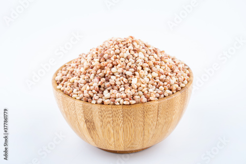 Grain grain sorghum rice in a bowl on white background