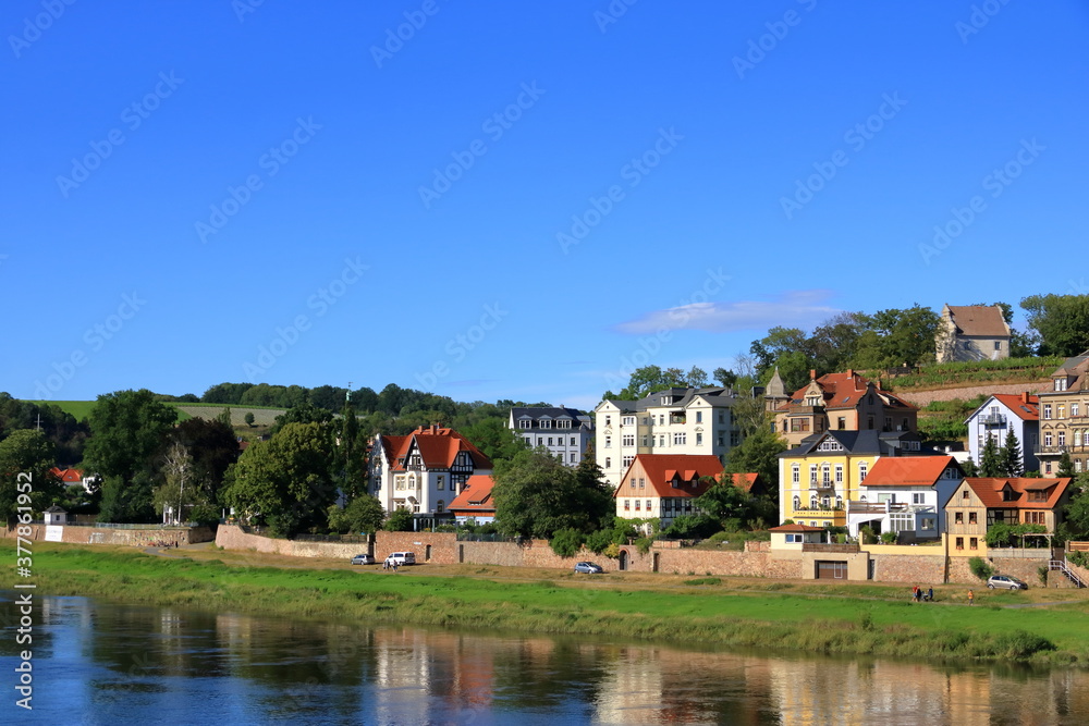 Obraz premium July 26 2020 - Meissen/Germany: old former fisherman's houses on the bank of the Elbe river in the area of Meissen, Saxony