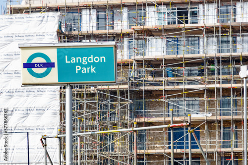 Sigh of Langdon Park Docklands Light Railway station with scaffolding  and construction site in the background photo