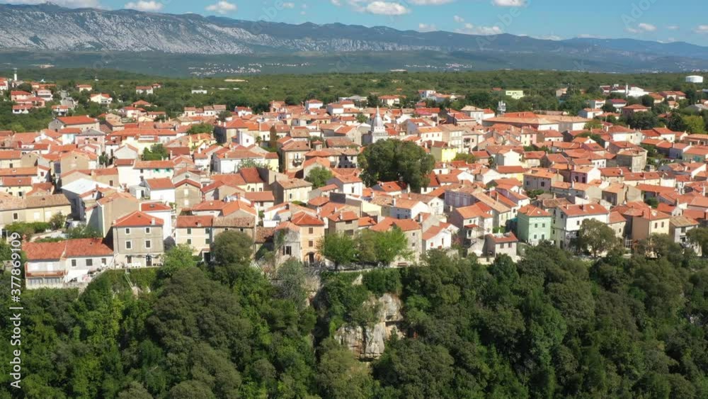 Aerial view of the old town of Omisalj on high cliff, Krk island, Kvarner, Croatia, drone reveal footage
Aerial view of the old town of Omisalj on high cliff, Krk island, Kvarner, Croatia, drone reveal footage