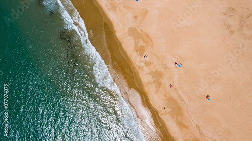 People on the beach of El Palmar. Aerial photography of sand beach in south Spain, Cadiz