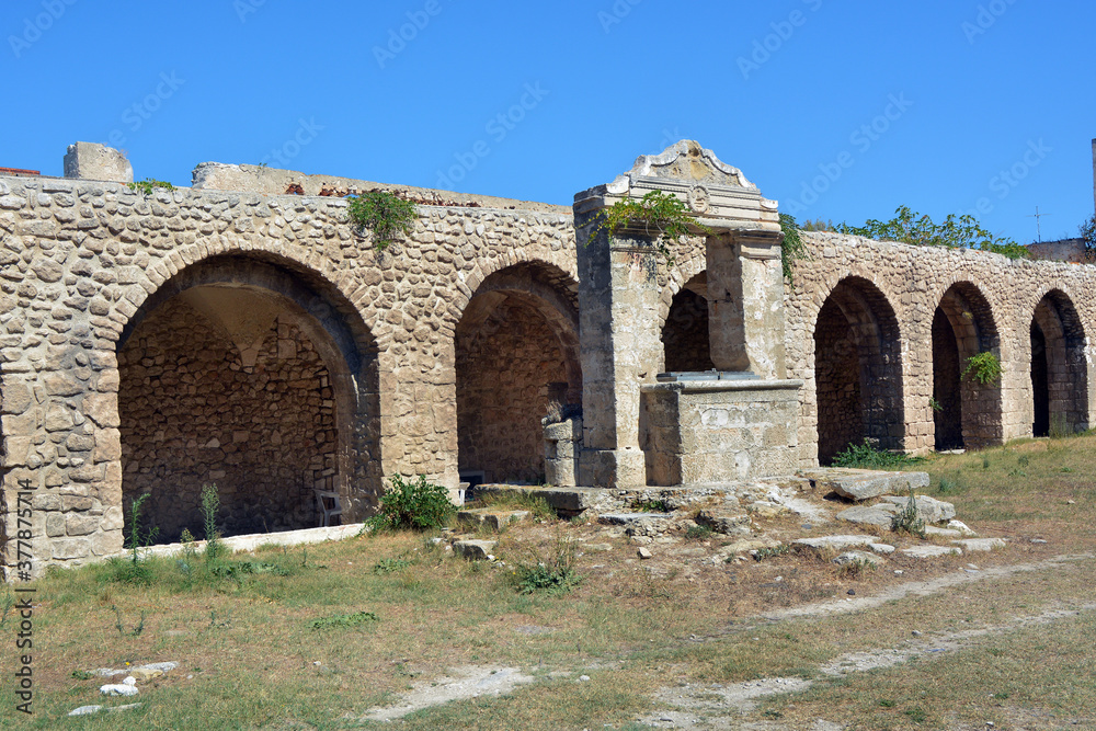 Tremiti, Puglia, Italy --The ancient cloister and the well of the abbey  of S. Maria al Mare at  Tremiti Islands, small islands in the Adriatic Sea, part of the Gargano park