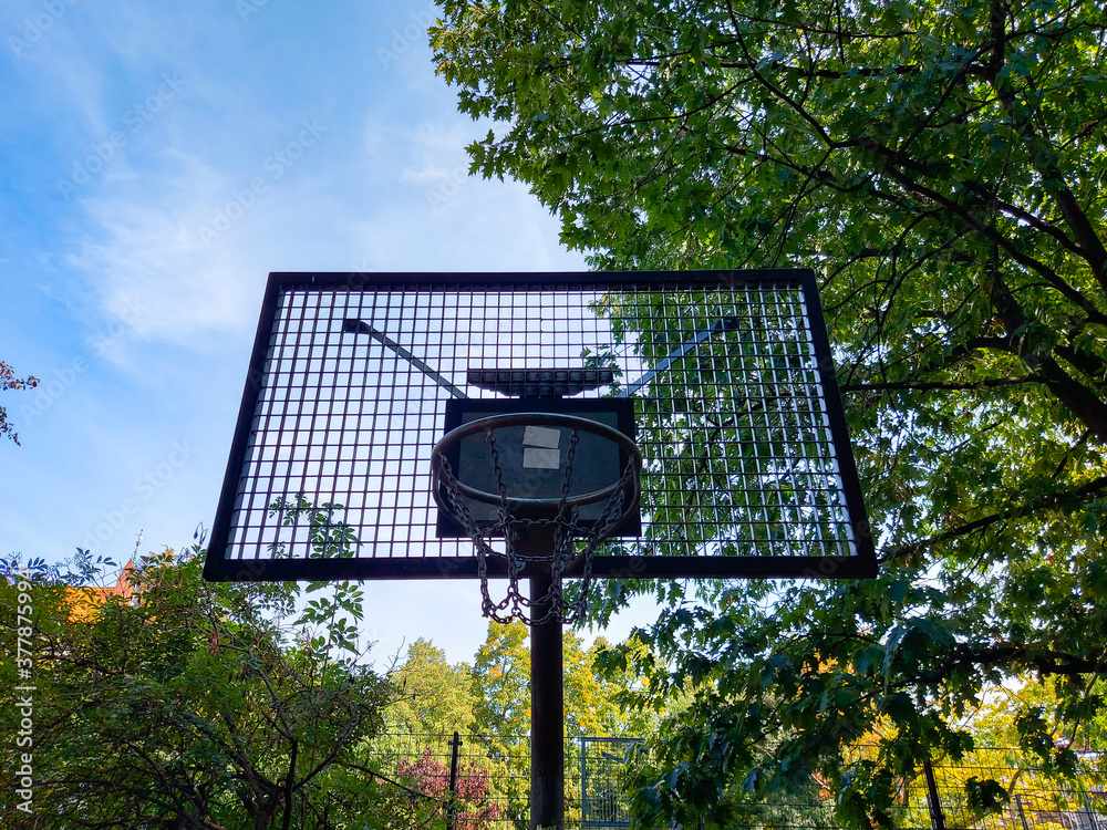 A basketball hoop on a playground