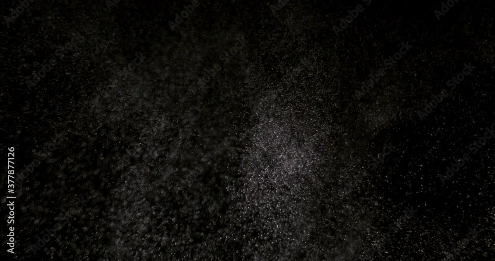 White dust powder isolated on black background White dust powder isolated on black background