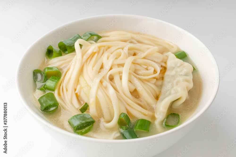 Dumpling Kalguksu on a white background