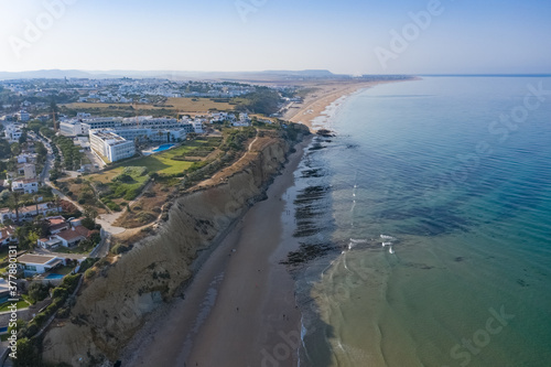 Morning aerial view of La Fontanilla beach in Conil de la Frontera