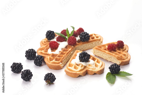 Obraz na płótnie Belgium waffles with fresh berries isolated on white background w salonie