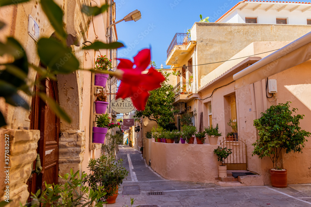 Rethymno, Greece - August 11, 2020 - View down a traditional residential street in the old town of Rethymno on the island of Crete