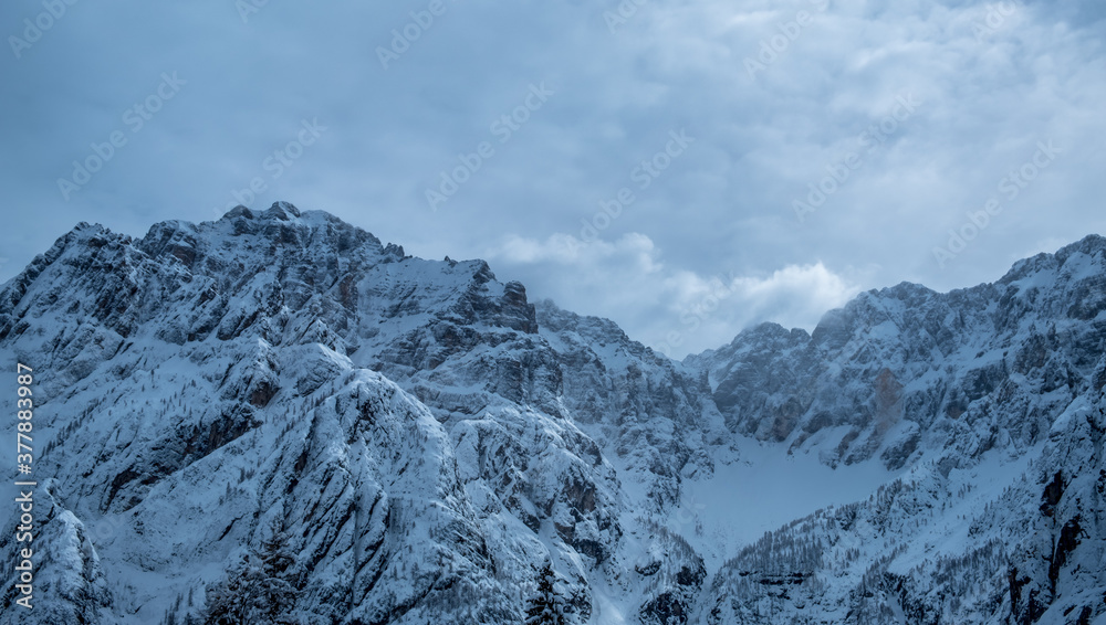 Trekking after a snowfall in the Julian Alps, Friuli-Venezia Giulia, Italy