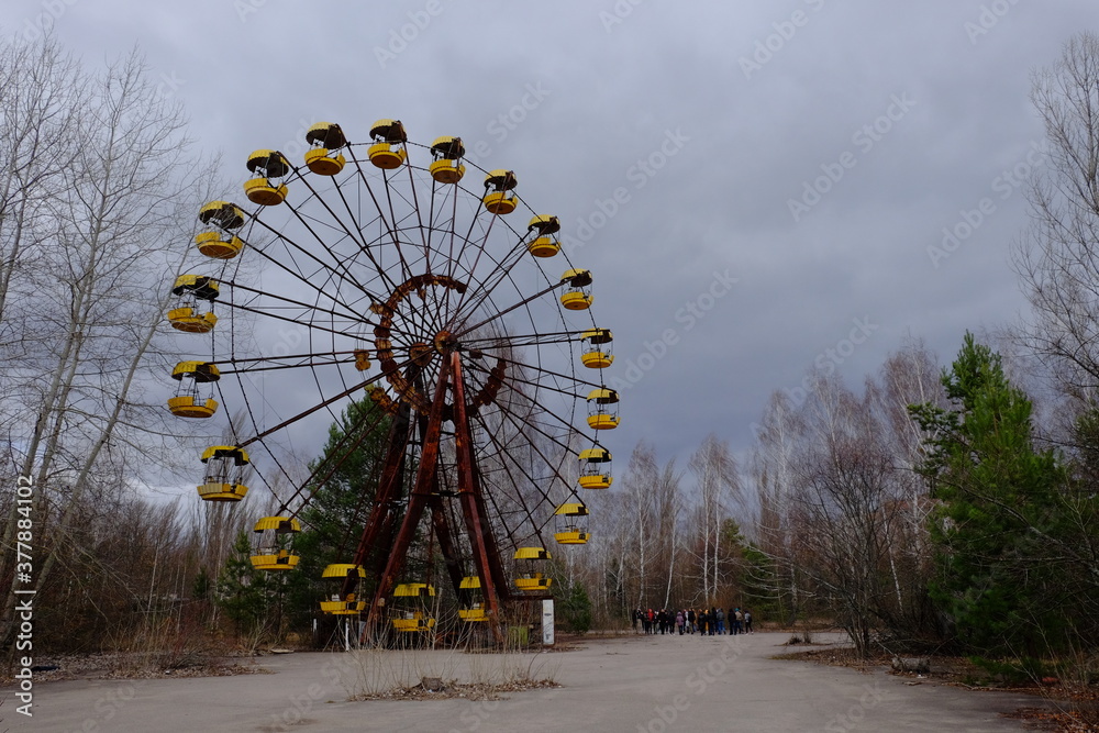 The famous Ferris wheel in an abandoned amusement park in Pripyat. Cloudy weather in the Chernobyl exclusion zone. The famous Ferris wheel in an abandoned amusement park in Pripyat. Cloudy weather in the Chernobyl exclusion zone.