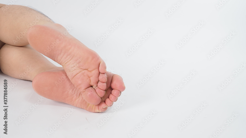 Naklejka premium close up of man sole of foot on white background