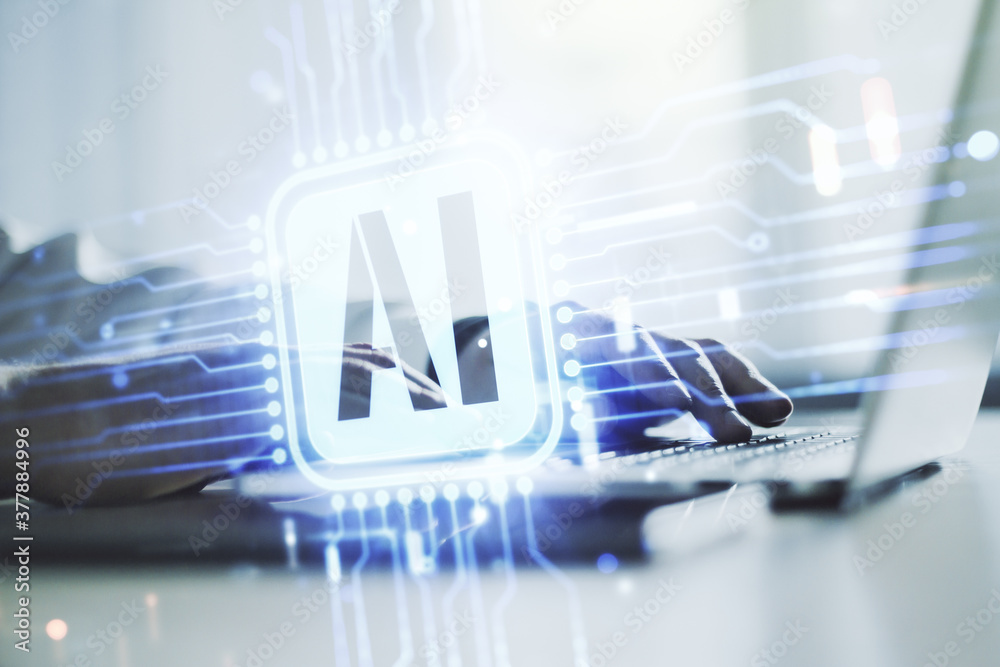 Double exposure of creative artificial Intelligence icon with hands typing on laptop on background. Neural networks and machine learning concept