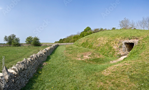 Belas Knap is a neolithic, chambered long barrow situated on Cleeve Hill, near Cheltenham and Winchcombe, in Gloucestershire, England.